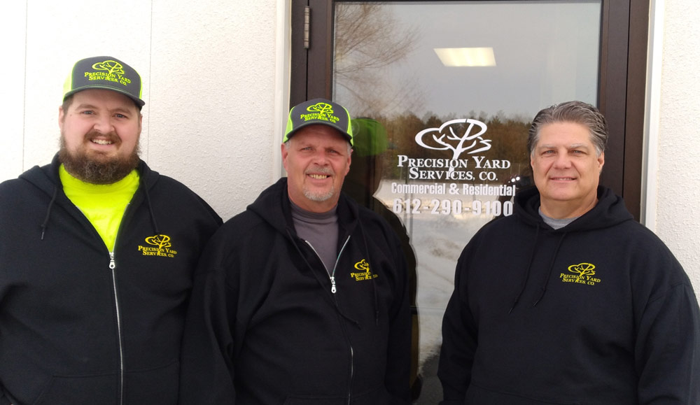 Precision Yard Services, Co. Team in front of their office