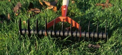 closeup of lawn scarifier, lawn aeration enhance soil water intake