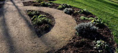 park paths with half circle shape garden walkway, garden plants with mulch